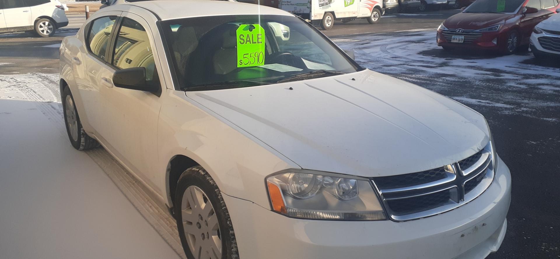 2013 Dodge Avenger SE (1C3CDZAG1DN) with an 3.6L V6 DOHC 24V FFV engine, 6-Speed Automatic transmission, located at 2015 Cambell Street, Rapid City, SD, 57701, (605) 342-8326, 44.066433, -103.191772 - Photo#2